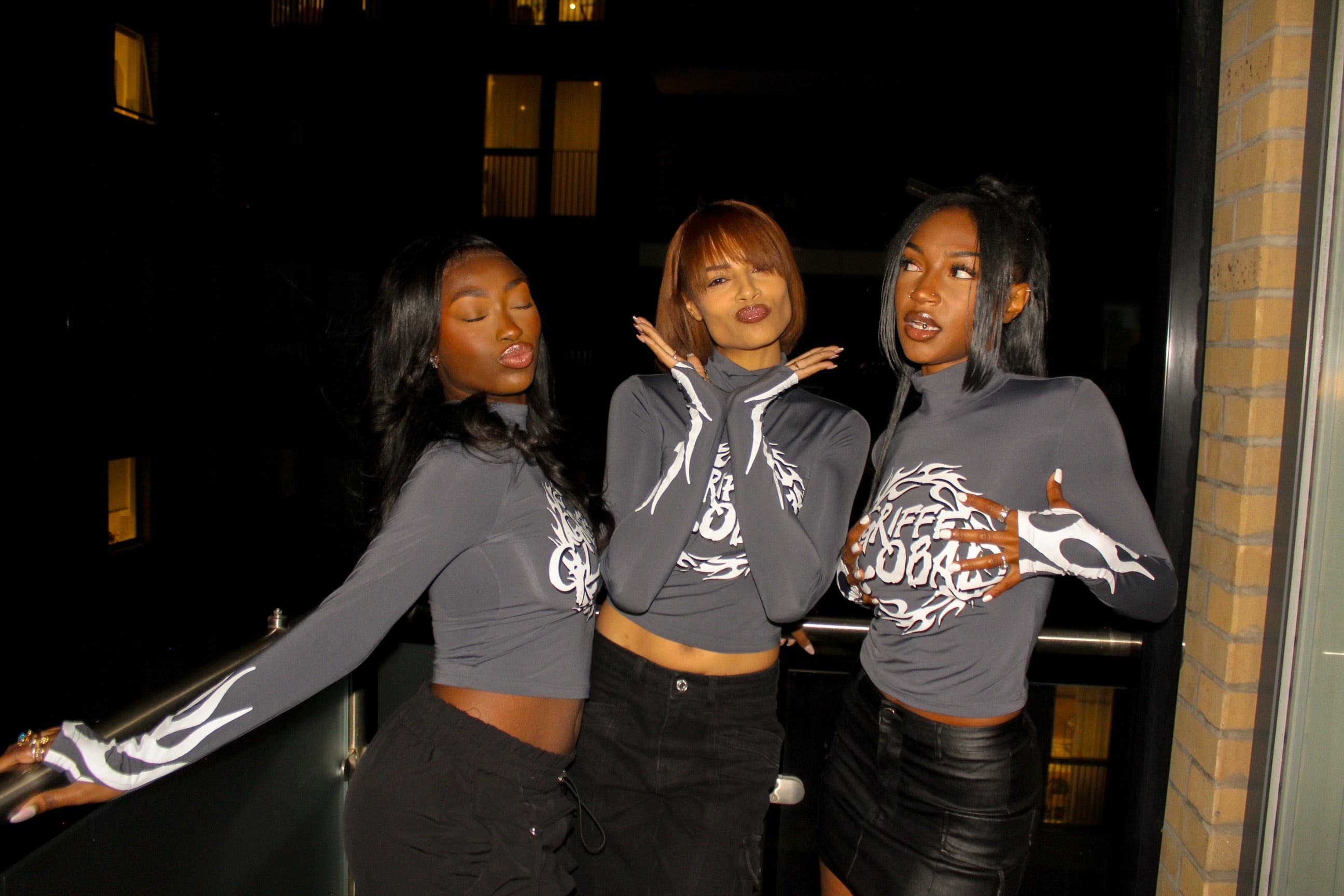 THE $GRIFFE TEA TOP